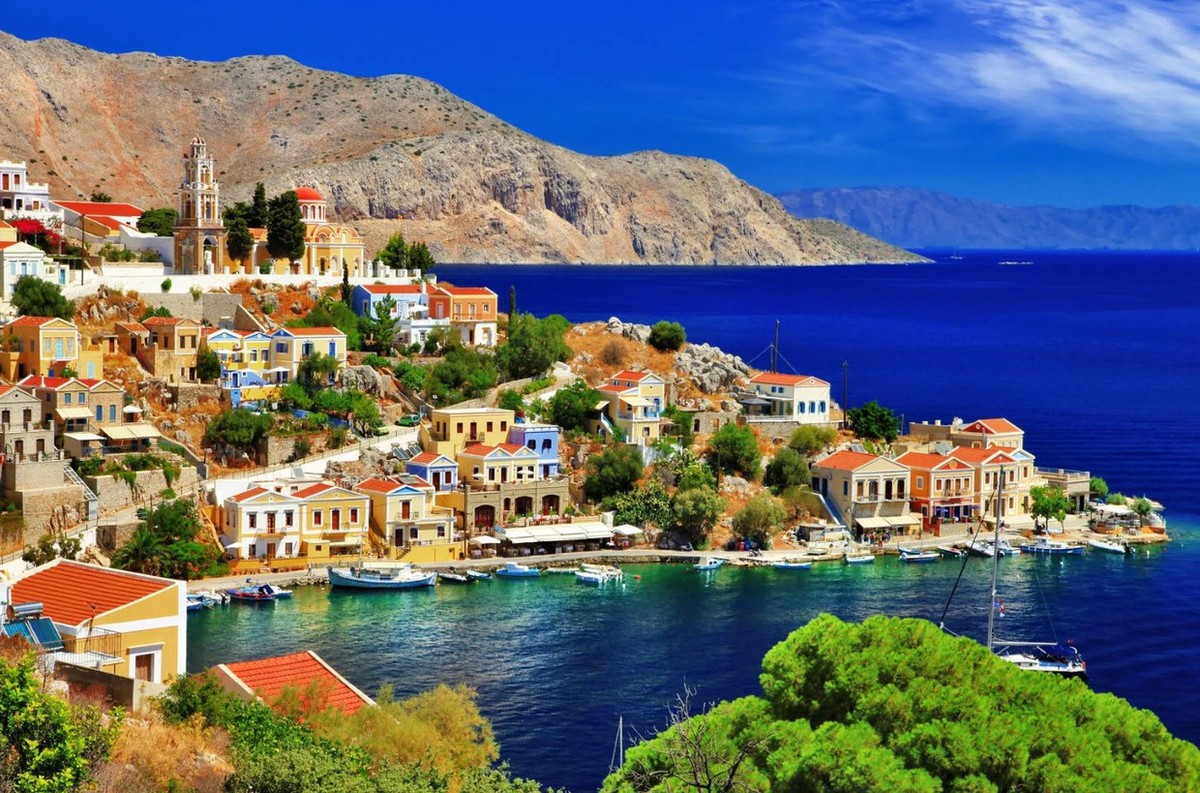 Colorful Greek island harbor on a sunny Mediterranean coast